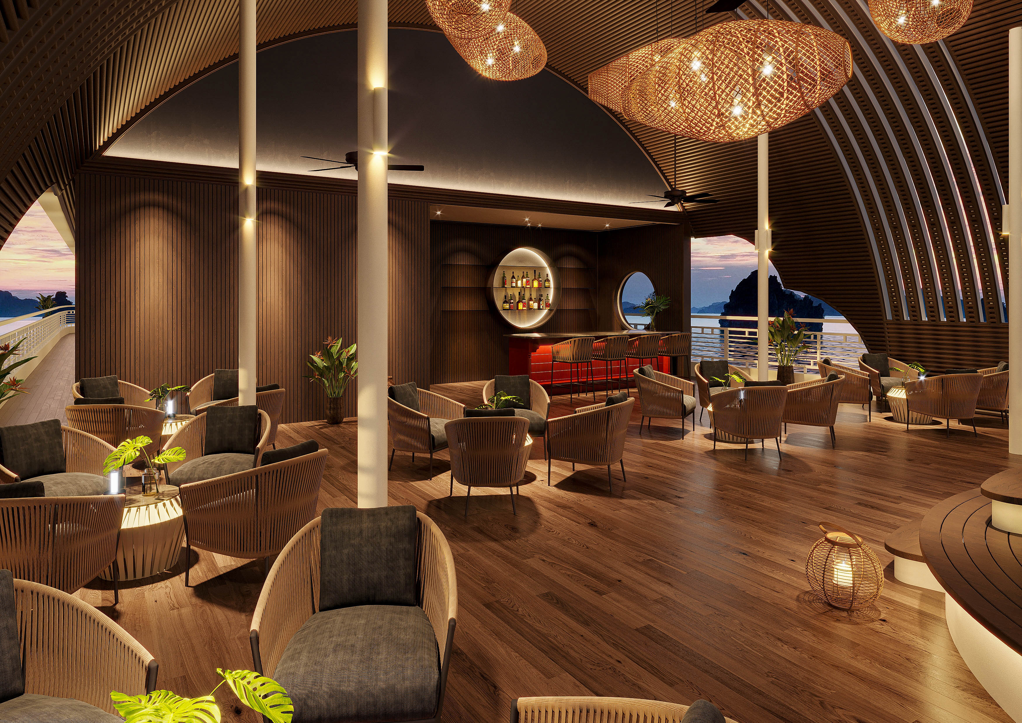 Warm Oris Cruise sunset lounge atmosphere with seating, soft lights, and Lan Ha Bay views